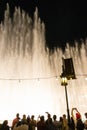 People enjoying Dubai fountain broadwalk UAE Royalty Free Stock Photo