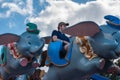 People enjoying Dumbo the Flying Elephant at Magic Kigndom 4