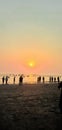 People are enjoying epic sunset with a circular sun ring in Bangladesh.