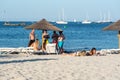 People enjoying the Es Pujols beach in Formentera, Spain in the summer of 2021 Royalty Free Stock Photo