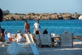 People enjoying the Es Pujols beach in Formentera, Spain in the summer of 2021 Royalty Free Stock Photo