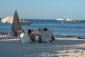 People enjoying the Es Pujols beach in Formentera, Spain in the summer of 2021 Royalty Free Stock Photo