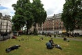 People enjoying fresh air in Green Park , London , England