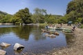 People enjoying the hot weather at Coniston Water