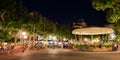 People enjoying music on Place Louis XIV at night, in St Saint de Luz