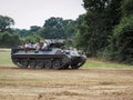 People Enjoying a Ride in an Armoured Car at Dunsfold Airfield