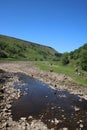 People enjoying River Swale on sunny June day