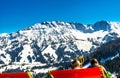 People enjoying snowy mountain landscape in the bavarian alps -