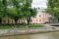 People enjoying summer day by the Aura river