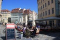 People enjoying a summer day at a cafe in Dresden