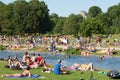 People enjoying the summer day in Englischer Garten city park in Munich, Germany. Royalty Free Stock Photo