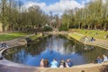 People enjoying the sun in spring in the park in Groningen