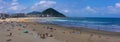 People enjoying the sun on Zurriola beach, City of San Sebastian, Basque Country