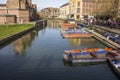 People enjoying a sunny spring day, punting in river Cam in Cambridge Royalty Free Stock Photo