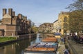 People enjoying a sunny spring day, punting in river Cam in Cambridge Royalty Free Stock Photo