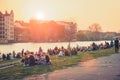 People enjoying sunset at river next to the Berlin Wall / East Side Gallery  in Berlin, Germany Royalty Free Stock Photo