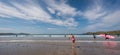 People enjoying sunshine hot day on Aberporth beach