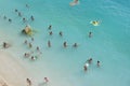 People enjoying and swimming in the clear blue sea