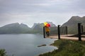 People, enjoying the view of Bergbont in Senja island, NorwayWoman, standing on the edge of a 44 meter long viewing platform,