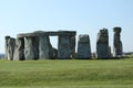 People enjoying view of Stonehenge, Neolithic ancient standing stone circle monument, UNESCO World Heritage Site