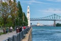 People enjoying warm summer day at the Old Port near the Clock Tower