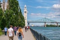 People enjoying warm summer day at the Old Port near the Clock Tower