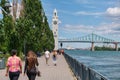 People enjoying warm summer day at the Old Port near the Clock Tower