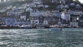 People enjoying warmer than average catching the Looe ferry to West Looe