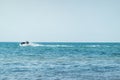 People enjoying water jet ski in a blue sea on a sunny day. Tropical holiday water activities Royalty Free Stock Photo