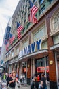 People enter Old Navy retail shop on Market street