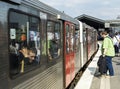 People enter the train at Baumwall Station in Hamburg