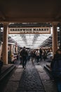 People entering Greenwich Market, London`s only market set within a World Heritage Site