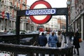 People entering the a London Underground station.