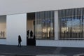 People entering a modern building of Fondacione Prada Prada Foundation in Milano, Italy