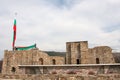 People erecting a bulgarian flag at Tsarevets fortress, Veliko Tarnovo, Bulgaria