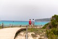 People in Es Calo de Sant Agusti fishing village on the island of Formentera in times of COVID19 Royalty Free Stock Photo