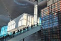 People on an escalator at an airport terminal Royalty Free Stock Photo