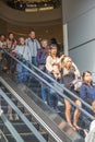 People on escalator mall