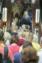 People on the escalator in the Metro. people in escalators