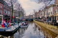 people on an excursion boat in a canal of Alkmaar, Netherlands