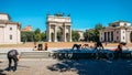 People exercise and socialise in front of Arco della Pace known as Arch of Peace in Milan, Italy, built as part of Foro Royalty Free Stock Photo
