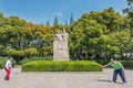 People exercising badminton marx and engels statue in fuxing par Royalty Free Stock Photo