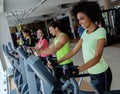 People exercising on a cardio training machines Royalty Free Stock Photo