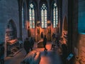 People exploring the Gothic Chapel at the Met Museum. Royalty Free Stock Photo