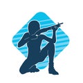 Silhouette of a female warrior in action pose with riffle gun weapon.