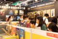 18 07 2021 People with face masks read and buy books in Hong Kong Book Fair in Hong Kong Convention and Exhibition Center , Wan Royalty Free Stock Photo