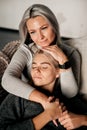 portrait of tender hugs of mother and daughter. warm relationship between mother and daughter