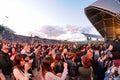 People (fans) scream and dance in the first row of a concert at Heineken Primavera Sound 2013 Festival