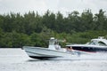 People on fast boats Miami. Shot with a telephoto lens