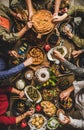 People feasting at table with traditional turkish foods and raki Royalty Free Stock Photo